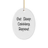Cobbling Gifts for Men, Funny Oval Ornament, Eat. Sleep. Cobbling. Repeat. Christmas Decorations from Family - Image 1